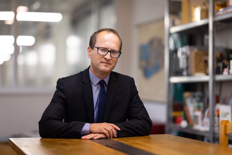 Tomas Havranek (Tomáš Havránek), at a desk, 2022