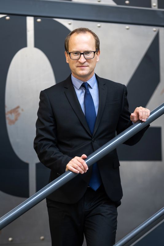 Tomas Havranek (Tomáš Havránek), by a stair railing, 2022