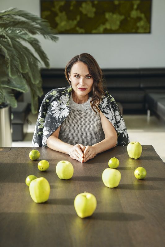 Zuzana Irsova (Zuzana Havránková), seated at a table, 2024